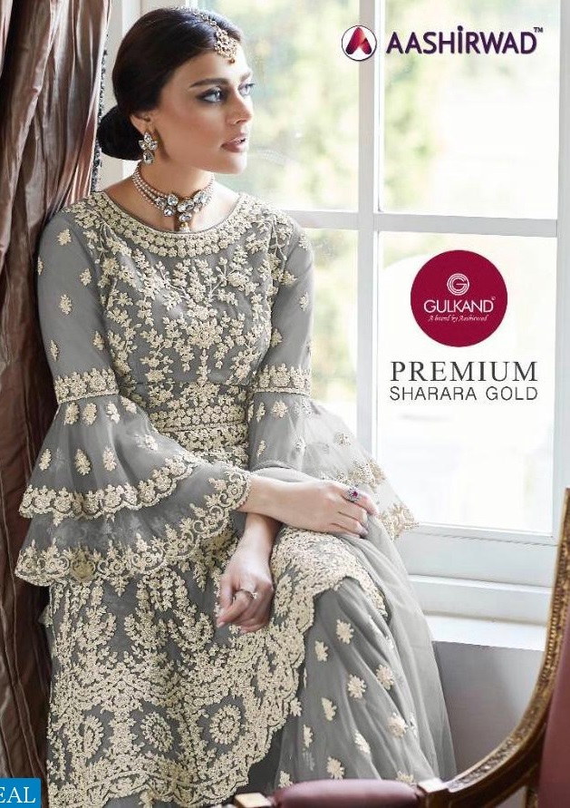 AASHIRWAD PREMIUM SHARARA GOLD 7024 DESIGNS COLORS DESIGNER DRESSES